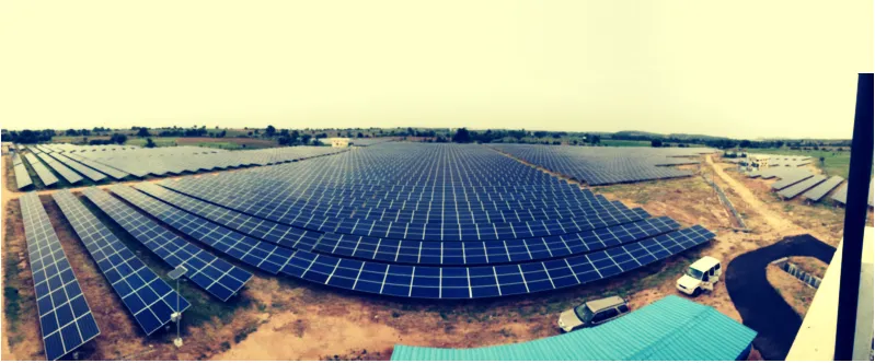 Aerial panoramic view of a ground-mounted solar PV plant